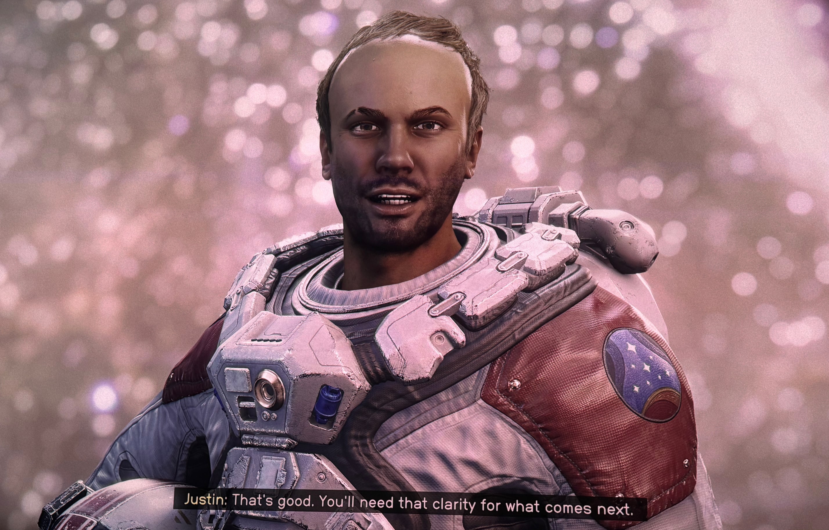 Justin in a spacesuit saying: "That's good. You'll need that clarity later"